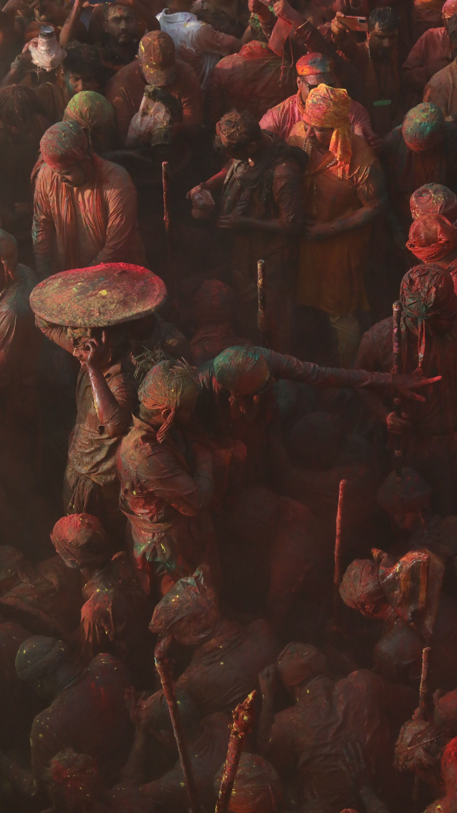 Crowd enjoying Holi colors at a festival celebration