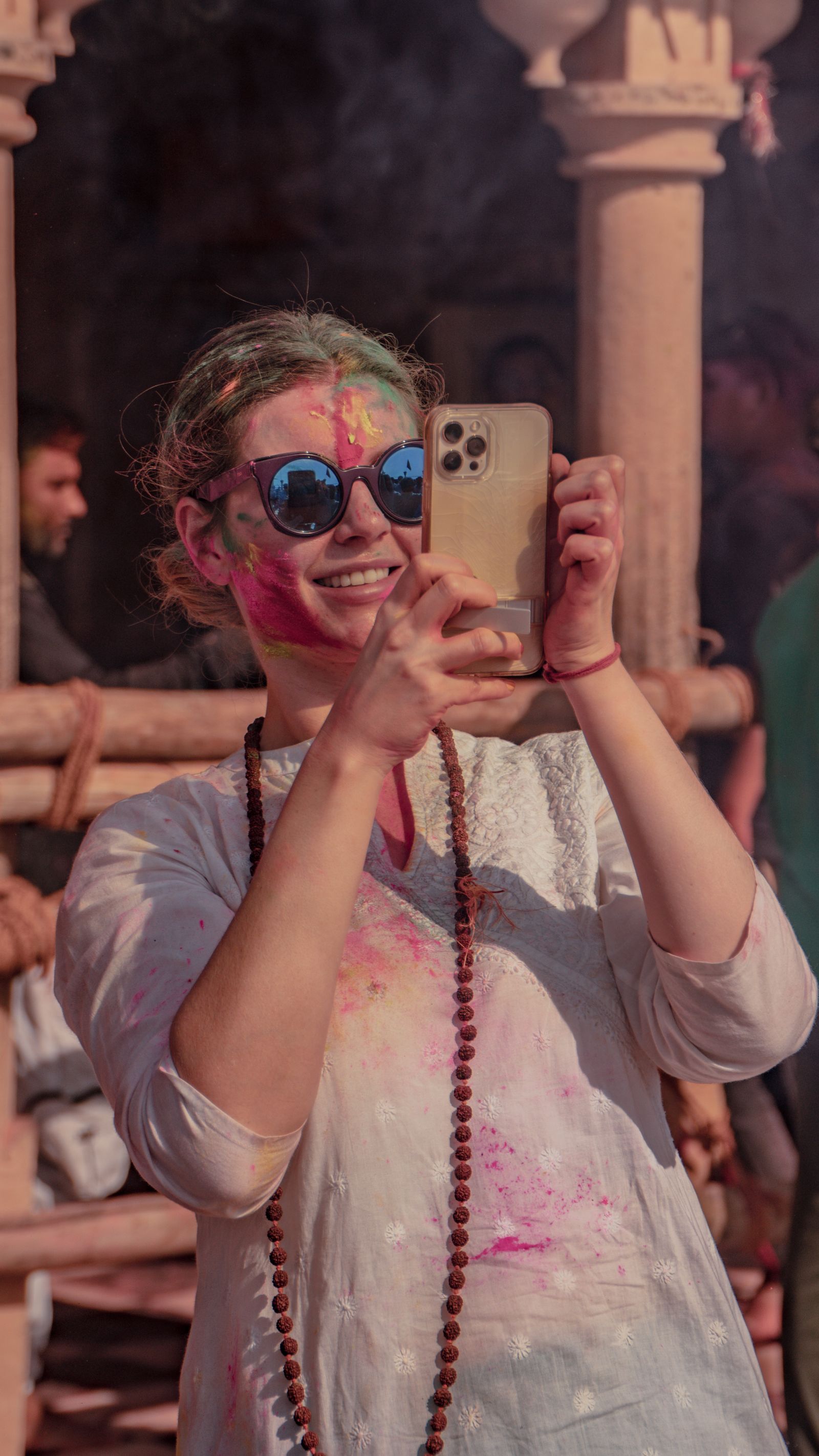 Guest viewing matched Holi photos instantly on their phone